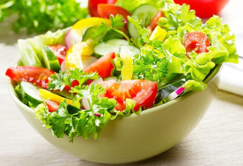 Bowl of healthy salad displayed.