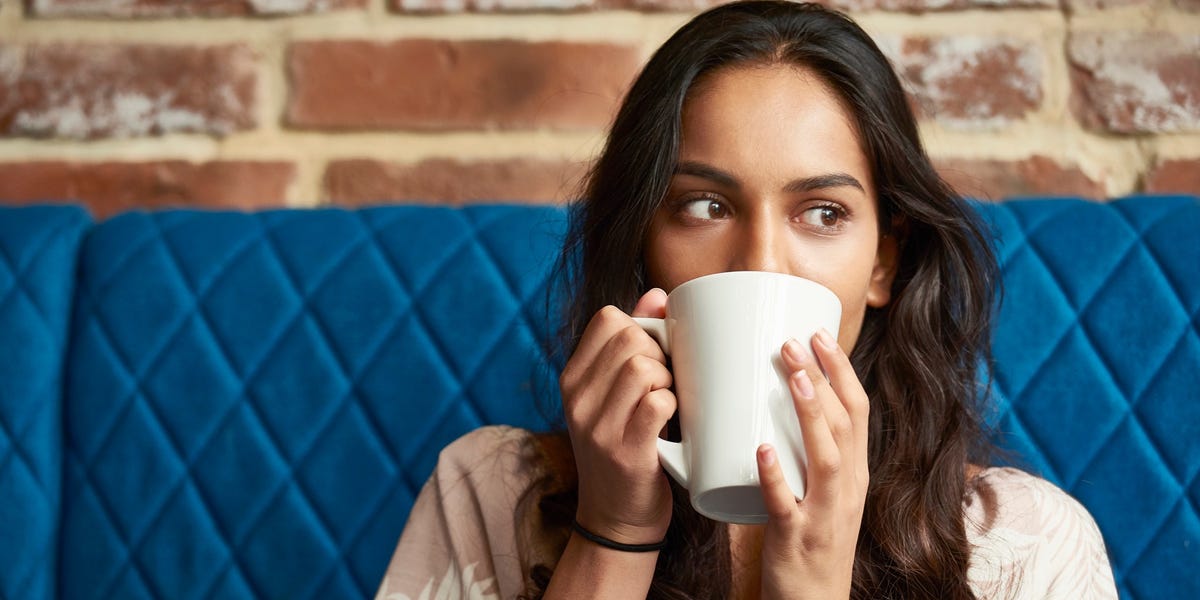 Woman drinking coffee in the morning.