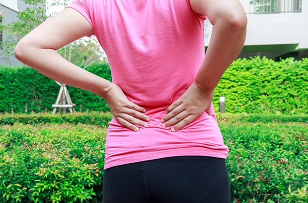 Lady with back pain.