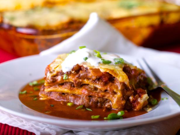 Plate of mexican lasagna displayed.