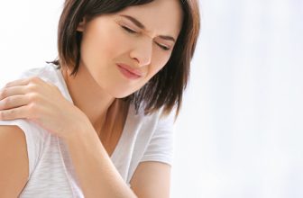 Young lady with shoulder pain.