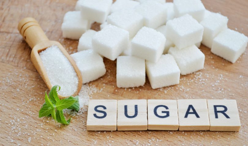 Sugar cubes displayed on a table.