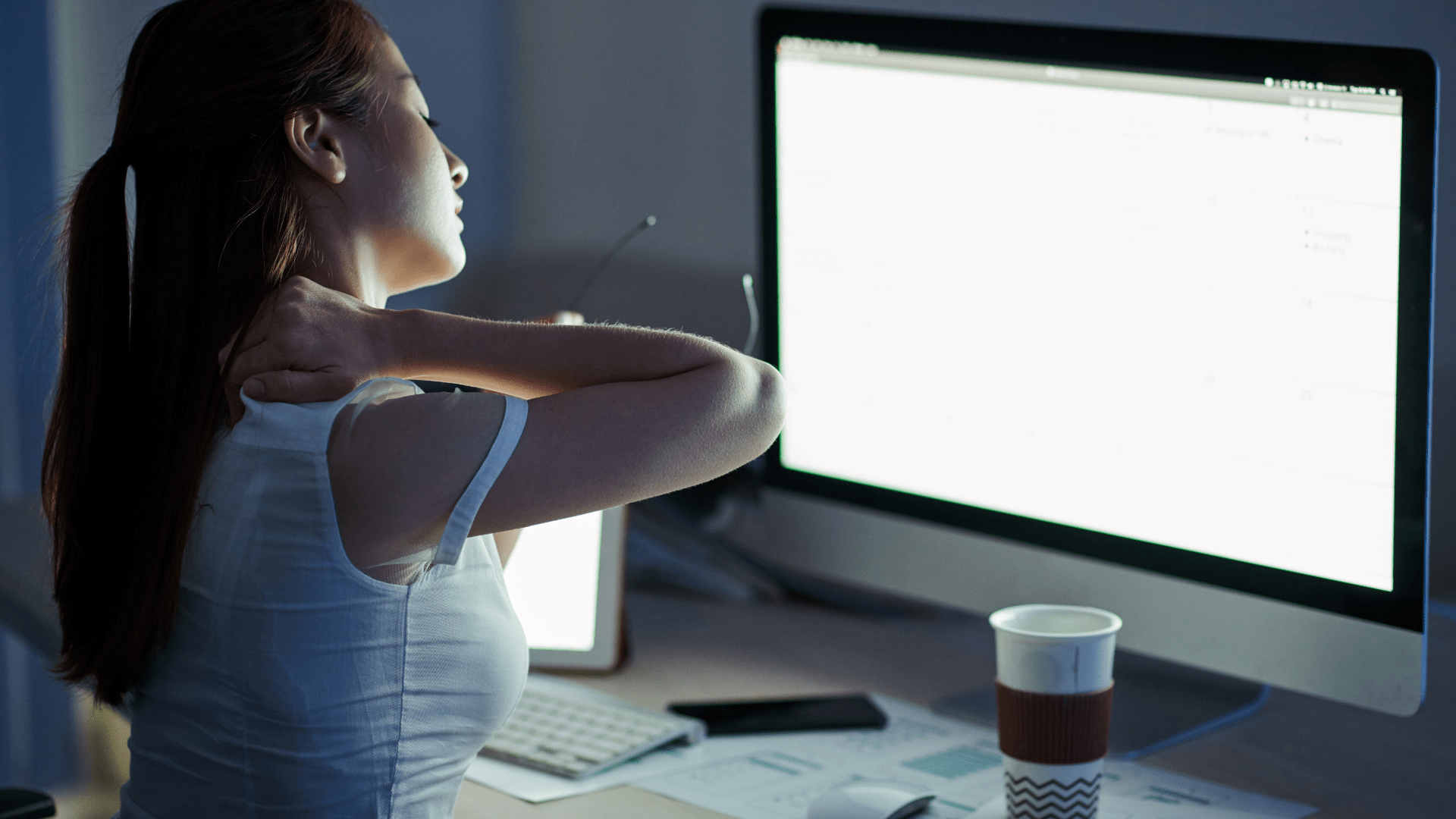 Woman using Tai Chi at her desk